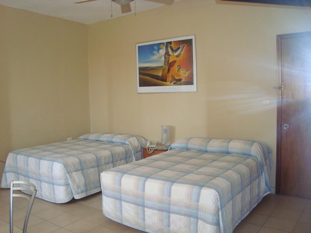 Galerias Hotel & Arts Tapachula Habitación foto